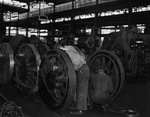 Texas and Pacific Railroad; men working on railway cars in roundhouse