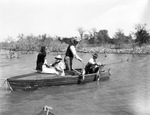Lake Brownwood State Park; fishermen and women in motor boat on the lake