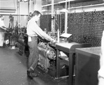 Workman at Star-Telegram monotype machine, 1949