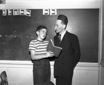 Herbert Lesser being instructed by Rabbi Charles Blumenthal