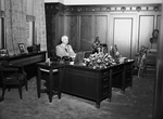 Amon G. Carter at his desk