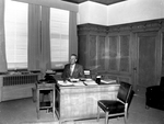 Bert N. Honea at his desk