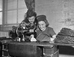 Mary Russell, left, and Lenora Whitley at National Youth Administration (N. Y. A.) sewing center