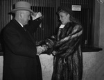 Miss Frances Totten greets Speaker Sam Rayburn