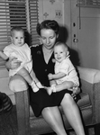 Mrs. Harold E. Braun of Houston, with her twin sons, Donald Kenneth (left) and David Harold