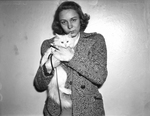 Mrs. Paul S. Holtzman with her cat