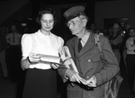 Guy Jones, retiring United States Mail Carrier, with Mrs. Rose Pope