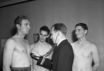 Charles Conway being examined by Lieutenant E. L. McCaffert, Dallas, Texas