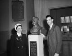 Mr. and Mrs. Joseph Eddy Lipe shown with bust of Will Rogers