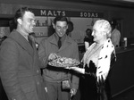 U. S. O. Center, Brownwood: Mrs. R. B. Rogers, Cooper Rice and Roy Galambos
