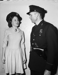 Delores Joe, 13 year old radio entertainer, and radio patrolman E. C. Purvis