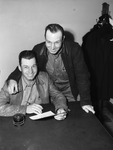 Dolphus J. Harmon, 29, and Arthur J. Harmon (standing) at Draft Board #7