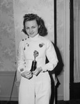 Harriet Knight, fencer, holding trophy