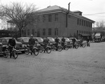 Swift & Company employees exchanging bicycles for cars