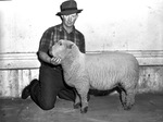 Harrison Davis and grand champion lamb