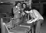 Women training for assembly line work