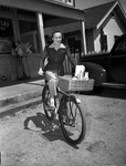 Mary Curlee delivering for Lakeview Grocery