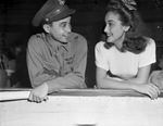 Dorothy Lamour and Captain H. T. Wheless on bond selling campaign in Fort Worth, Texas