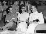 Dorothy Lamour with various groups during a war bond sales tour