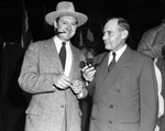 James S. Moran of Washington , D. C. and Texas Governor Coke Stevenson during a war bond drive with Dorothy Lamour