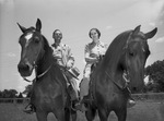 Mr. and Mrs. Oscar C. Davis on horseback