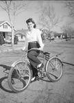 Mrs. Thomas Ellis on bike