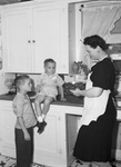 Office of Civil Defense block Mothers. Mrs. James T. Dearing and two sons, Rod Roy, 6, and Dennie Jim, 4.