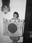 Mrs. R. G. Conder and Flag from Guadalcanal