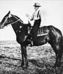 C. M. (Uncle Charlie) Brown on horseback