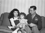 Lieutenant Colonel Cecil L. Faulkner, 27, with his wife, Fay, and his daughter, Wendy.