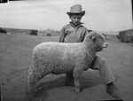 Wayne Underwood with lamb by Frank Reeves Sr.