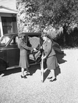 Mrs. G. Herbert Beavers Junior, left, and Mrs. Will F. Collins, loading furniture for Fort Worth Army Air Field