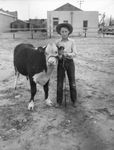 Curtis Finley and his calf by Frank Reeves Sr.