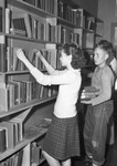 Liberator Village. Glynn Ellen Pruett and Gilford Brown in library