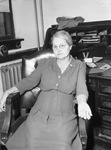 Mrs. R. L. Buster, Abilene Chief of Police. Mrs Robert L. Buster in her office