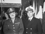 Fort Worth Poultry and Egg Company. Army-Navy "E" award. Lieuteant Commander G. W. Cook Junior, right, and Colonel Wannie L. Bartley