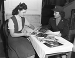 Pvt. Mary L. Nystrum, "Mrs. Air-WAC," with Mary Anderson