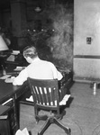 Royce Yancey, at his desk.