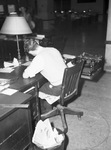 Royce Yancey, at his desk.