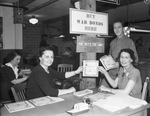 Fourth War Loan Drive: Mrs. Audra L. Kidd, Miss Sally Casey, and Captain George O. Sokol