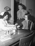 Red Cross Blood Donor Service: Miss Ann Meroney, Private Helen Reilly and Private First Class Ellen Sandridge