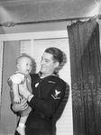 Charles W. Rivers holding his son, Donnie