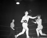 Golden Gloves. Action. Richard Von Reyn, right, and Grand Finnigan.
