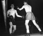 Golden Gloves. Action. Gene Abshire, left, of Convair and Glen Thornton.