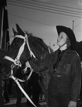 Southwestern Exposition and Fat Stock Show attendee Elverna Criswell, Throckmorton, Texas with her horse "Sport"