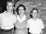 Mrs. C. A. Hanson and her two sons, R. G. Hanson and Noble Hanson
