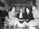 Lieutenant Sammye Louise Whiteside, Mrs. Horace Whiteside, Sergeant Horace Whiteside Junior and Seaman First Class Jeanne Whiteside.