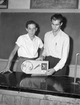 Jackie Everett and Don Graves with a radio