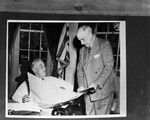 Amon Carter shares documents with President Franklin Delano Roosevelt