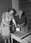 North Side High School canning center. Mrs. John B. Todd and Mrs. L. L. Todd